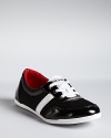 Fashionably sporty, DKNY's Waverly mesh sneakers boast contrasting stripe details for the stylish city girl on the move.
