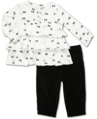 This super cute 2 piece set by Carter's includes a bow print jersey tunic with ruffles plus jersey pants. This super cute 2 piece set by Carter's includes a bow print jersey tunic with ruffles plus jersey pants.