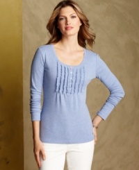 Tommy Hilfiger's ruffled henley top strikes a balance between feminine and rugged. Pair it with white jeans for an essential weekend look. Tommy Hilfiger's ruffled henley top strikes a balance between feminine and rugged. Pair it with white jeans for an essential weekend look.