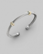 From the Thoroughbred Collection. A signature Yurman sterling silver cable, richly adorned with two textured bands of 14k gold. Sterling silver & 14k yellow gold Cable, 5mm Diameter, about 2¼ Made in USA