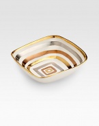 A beautiful design inspired by the pageantry of ancient horseraces, handcrafted in pristine porcelain with concentric circles glazed in 24k gold, platinum and rose gold. Dishwasher safe 4¾W X 1½H X 4¾D Made in USA 