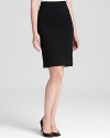 A careerist essential, this MICHAEL Michael Kors pencil skirt sets the tone for smart, strong dressing with an impeccably tailored and flawlessly sleek silhouette.