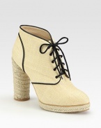 Artfully crafted, woven straw design with a lace-up front and an espadrille heel and platform. Stacked rope heel, 4½ (115mm)Covered platform, ½ (15mm)Compares to a 4 heel (100mm)Woven straw upperLeather liningRubber solePadded insoleImportedOUR FIT MODEL RECOMMENDS ordering one half size up as this style runs small. 