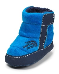 The North Face® crafts ultra-cozy winter booties in bright blue, lined with fleece and 100 g Heatseeker™ insulation to keep little toes toasty.