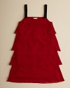 Lightweight tears lend a weightless look and feel to Sally Miller's perfect little party dress.