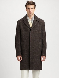 Luxurious wool overcoat with concealed button closure, front welt pockets and a single rear vent, beautifully tailored to be worn over your standard suiting.Button frontWaist welt pocketsRear ventAbout 38 from shoulder to hemWoolDry cleanMade in Italy Luxurious wool overcoat with concealed button closure, front welt pockets and a single rear vent, beautifully tailored to be worn over your standard suiting.Button frontWaist welt pocketsRear ventAbout 38 from shoulder to hemWoolDry cleanMade in Italy