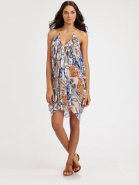 Draped in luxury, an abstract-lotus print coverup with draped details for an ultra-flattering look. Round neckSleevelessFlattering gathered detailsPull-on style95% modal/5% spandexHand washMade in USA of Italian fabric Draped in luxury, an abstract-lotus print coverup with draped details for an ultra-flattering look. Round neckSleevelessFlattering gathered detailsPull-on style95% modal/5% spandexHand washMade in USA of Italian fabric