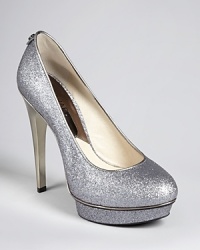 Stand out-and tall-your next evening on the town in these sparkling glitter platform pumps with liquid metallic leather accents from MICHAEL Michael Kors. Stand out-and tall-your next evening on the town in these sparkling glitter platform pumps with liquid metallic leather accents from MICHAEL Michael Kors.
