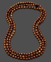 Wrap this fiery strand of bright chocolate freshwater pearls (7-8 mm) around for an eye-catching touch. Approximate length: 64 inches.