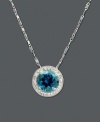 Like staring into a clear blue pool, this vibrant pendant will add a touch of color to your neckline. Necklace features a round-cut London blue topaz (1-5/8 ct. t.w.) and round-cut diamond (1/10 ct. t.w.). Set in 14k white gold. Approximate length: 18 inches. Approximate drop: 3/8 inch.
