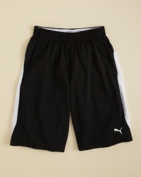 PUMA's full-throttle athletic shorts bring rugged, sporty style to his active wardrobe. PUMA's full-throttle athletic shorts bring rugged, sporty style to his active wardrobe.