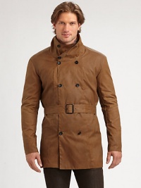 A double-breasted coat with a classic belted look and convenient double back vent.Stand collarBelted styleSlash pocketsDouble back ventAbout 33 from shoulder to hem80% cotton/20% nylonDry cleanMade in USA