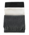 Top off your cold-weather wardrobe with the sleek, versatile style and ultra-soft feel of this solid Hugo Boss fringe scarf, crafted in a smooth blend of virgin wool and Pima cotton.