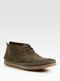 Expert craftsmanship is displayed with this perforated lace-up bootie, handsomely crafted in rich Italian suede.Suede upperLeather liningPadded soleRubber soleMade in Italy Expert craftsmanship is displayed with this perforated lace-up bootie, handsomely crafted in rich Italian suede.Suede upperLeather liningPadded soleRubber soleMade in Italy