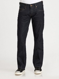 A classic dark wash fabric is accented by contrast stitching in a slim silhouette for a heritage look and feel.Five-pocket styleZip flyStitched back pocketsInseam, about 33CottonMachine washMade in USA A classic dark wash fabric is accented by contrast stitching in a slim silhouette for a heritage look and feel.Five-pocket styleZip flyStitched back pocketsInseam, about 33CottonMachine washMade in USA