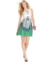 A bold floral print brings bright summer style to this Desigual dress -- perfect for a standout look!