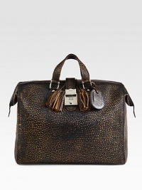 Brown grainy leather duffel with double zip top closure and leather tassels.Closing leather strap with combination lockInside pocket with a Gucci crest zipperFive metal feetBeige cotton and linen liningLeather24W x 12.6H x 9DMade in Italy Brown grainy leather duffel with double zip top closure and leather tassels.Closing leather strap with combination lockInside pocket with a Gucci crest zipperFive metal feetBeige cotton and linen liningLeather24W x 12.6H x 9DMade in Italy