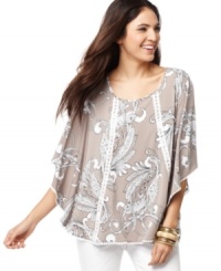 A printed poncho-style top adds relaxed elegance to any outfit! Try Style&co.'s top with your favorite shorts and capris. A printed poncho-style top adds relaxed elegance to any outfit! Try Style&co.'s top with your favorite shorts and capris.