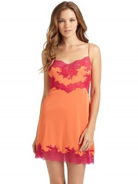 THE LOOKSlight v-neckAdjustable strapsContrast lace necklineContrast lace hemTHE FITAbout 38 from shoulder to hemTHE MATERIALPolyesterContrast: nylon/elastaneCARE & ORIGINMachine washImported THE LOOKSlight v-neckAdjustable strapsContrast lace necklineContrast lace hemTHE FITAbout 38 from shoulder to hemTHE MATERIALPolyesterContrast: nylon/elastaneCARE & ORIGINMachine washImported