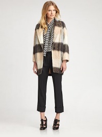 This soft wool style features a chic, oversized silhouette and a bold check pattern.Notched lapelsConcealed button closureBracelet sleevesCotton liningAbout 27 from shoulder to hem95% wool/5% polyamideDry cleanImportedModel shown is 5'9 (175cm) wearing US size 4. This soft wool style features a chic, oversized silhouette and a bold check pattern.Notched lapelsConcealed button closureBracelet sleevesCotton liningAbout 27 from shoulder to hem95% wool/5% polyamideDry cleanImportedModel shown is 5'9 (175cm) wearing US size 4.