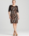 Elegant lace meets lively exotics for a statement Karen Kane Plus dress sure to stand out.