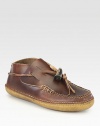 Hand-stitched moccasin expertly crafted in supple leather.Leather upperLeather liningPadded insoleLeather soleMade in USA