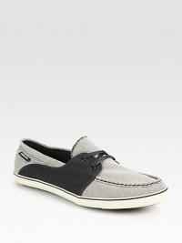 Two-tone, cotton canvas upper adds a contemporary touch to a casual classic.Cotton canvas upperPadded insoleRubber soleImported Two-tone, cotton canvas upper adds a contemporary touch to a casual classic.Cotton canvas upperPadded insoleRubber soleImported