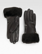 A soft, dyed shearling cuff and luxurious cashmere lining help make this leather style a cold weather essential. About 9 longSpecialist dry cleanImportedFur origin: Spain