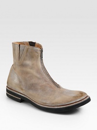 Vintage ankle boot with center zip closure exudes downtown cool, constructed in Italy in distressed leather.Leather upperLeather liningPadded insoleRubber soleMade in Italy Vintage ankle boot with center zip closure exudes downtown cool, constructed in Italy in distressed leather.Leather upperLeather liningPadded insoleRubber soleMade in Italy