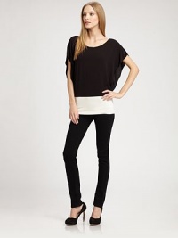 Colorblock jersey in an effortless dropped-shoulder style.BoatneckDropped shouldersDolman sleevesDropped waistbandAbout 26 from shoulder to hem94% rayon/6% spandexDry cleanMade in USAModel shown is 5'9 (175cm) wearing US size Small. Colorblock jersey in an effortless dropped-shoulder style.BoatneckDropped shouldersDolman sleevesDropped waistbandAbout 26 from shoulder to hem94% rayon/6% spandexDry cleanMade in USAModel shown is 5'9 (175cm) wearing US size Small.