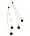 Dust your shoulders! Fiercely bold and beaded, GUESS's double drop earrings feature shiny black and leopard-printed glass beads. Set in gold tone mixed metal. Approximate drop: 5-1/4 inches.