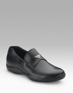 Supple calfskin with logo band across vamp. Leather lining Padded insole Rubber sole Made in Italy 