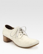 Tried-and-true leather flat with skinny laces and a slight stacked heel. Stacked heel, 1 (25mm)Leather upperLeather lining and solePadded insoleMade in ItalyOUR FIT MODEL RECOMMENDS ordering true size. 