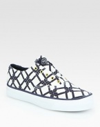 Sporty canvas essential in a lattice-like print, finished with a modern laceless front and rubber sole for traction. Rubber platform, 1 (25mm)Canvas upperCanvas liningRubber solePadded insoleImported