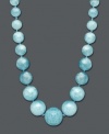 Embrace the blues in cool aqua-colored hues. Necklace crafted in 14k gold with blue aquamarine graduated beads (400 ct. t.w.). Approximate length: 20 inches.