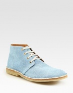 Interesting update to a classic chukka style, structured in lightweight and light-washed denim.Denim upperLeather liningPadded insoleRubber soleMade in Italy