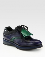 Lace-up leather oxford design with tassel detail. Foam heel, 1 (25mm)Foam platform, ½ (15mm)Compares to a ½ heel (15mm)Leather upperLeather liningRubber solePadded insoleMade in ItalyOUR FIT MODEL RECOMMENDS ordering one half size up as this style runs small. 