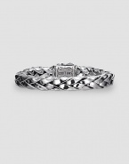 Hand woven silver design with signature 18K gold accent clasp. About 8½ long Dual locking clasp Made in USA