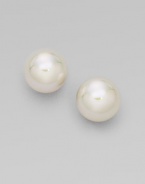 Classic white pearl studs are eternally chic. 14mm organic man-made pearls 18k goldplated sterling silver Post back Made in Spain