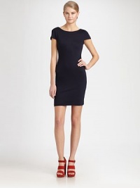 Skin-baring back cutouts elevate this fitted cap-sleeve sheath.BoatneckDropped shouldersElbow sleevesAsymmetric hemAbout 17 from natural waist74% rayon/20% polyamide/6% spandexDry cleanImportedModel shown is 5'10 (177cm) wearing US size Small. Skin-baring back cutouts elevate this fitted cap-sleeve sheath.BoatneckDropped shouldersElbow sleevesAsymmetric hemAbout 17 from natural waist74% rayon/20% polyamide/6% spandexDry cleanImportedModel shown is 5'10 (177cm) wearing US size Small.