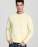 Toss on this handsome pullover crewneck sweater when you need something lightweight and easy to pair.