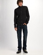 A new-look sweater for downtown guys, shaped with wide ribbing and a unique buttonfront. Leather elbow patches and placket trim add smart tonal detail. Buttonfront Chest patch pockets Leather elbow patches and placket trim 50% acrylic/30% wool/20% linen Dry clean Imported 