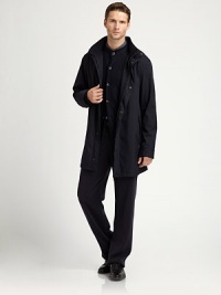 Travel in style in this lightweight car coat with hidden hood and draw cord waist.Zip and snap button frontSlashed side pocketsAbout, 33 from shoulder to hem PolyesterDry cleanImported Travel in style in this lightweight car coat with hidden hood and draw cord waist.Zip and snap button frontSlashed side pocketsAbout, 33 from shoulder to hem PolyesterDry cleanImported