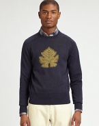 Be the center of attention in this classic crewneck, handsomely woven in soft cotton, with leaf print design.CrewneckRibbed knit collar, cuffs and hemCottonDry cleanImported