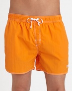 With stitched details and a grip-tape back patch pocket, these stylish swim trunks are both sporty and functional.Elastic drawstring waistStich detail at flySlash side pocketsBack grip-tape patch pocketInseam, about 4½PolyamideMachine washImported