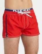 A summer beach essential for the contemporary man, shaped in quick-drying nylon and finished with an elastic logo waistband.Elastic drawstring-tie waistRear patch pocketInseam, about 2PolyesterMachine washImported