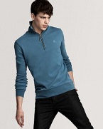 Burberry's sleek sweater rendered in a weathered garment wash for a comfy, lived-in look.