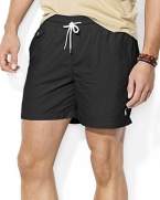 The classic-fitting Traveler swim short is rendered in quick-drying nylon for casual comfort in the sun and sand.