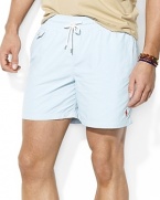 The classic-fitting Traveler swim short is rendered in quick-drying nylon for casual comfort in the sun and sand.