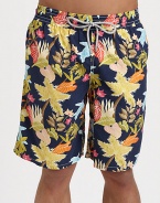 You'll be prepared for fun in the sun, sea and beyond in these tropical print trunks, set in quick-drying nylon with rear eyelets to avoid ballooning effect.Elastic drawstring waistSide slash, back flap pocketInseam, about 9Polyamide nylonMachine washImported